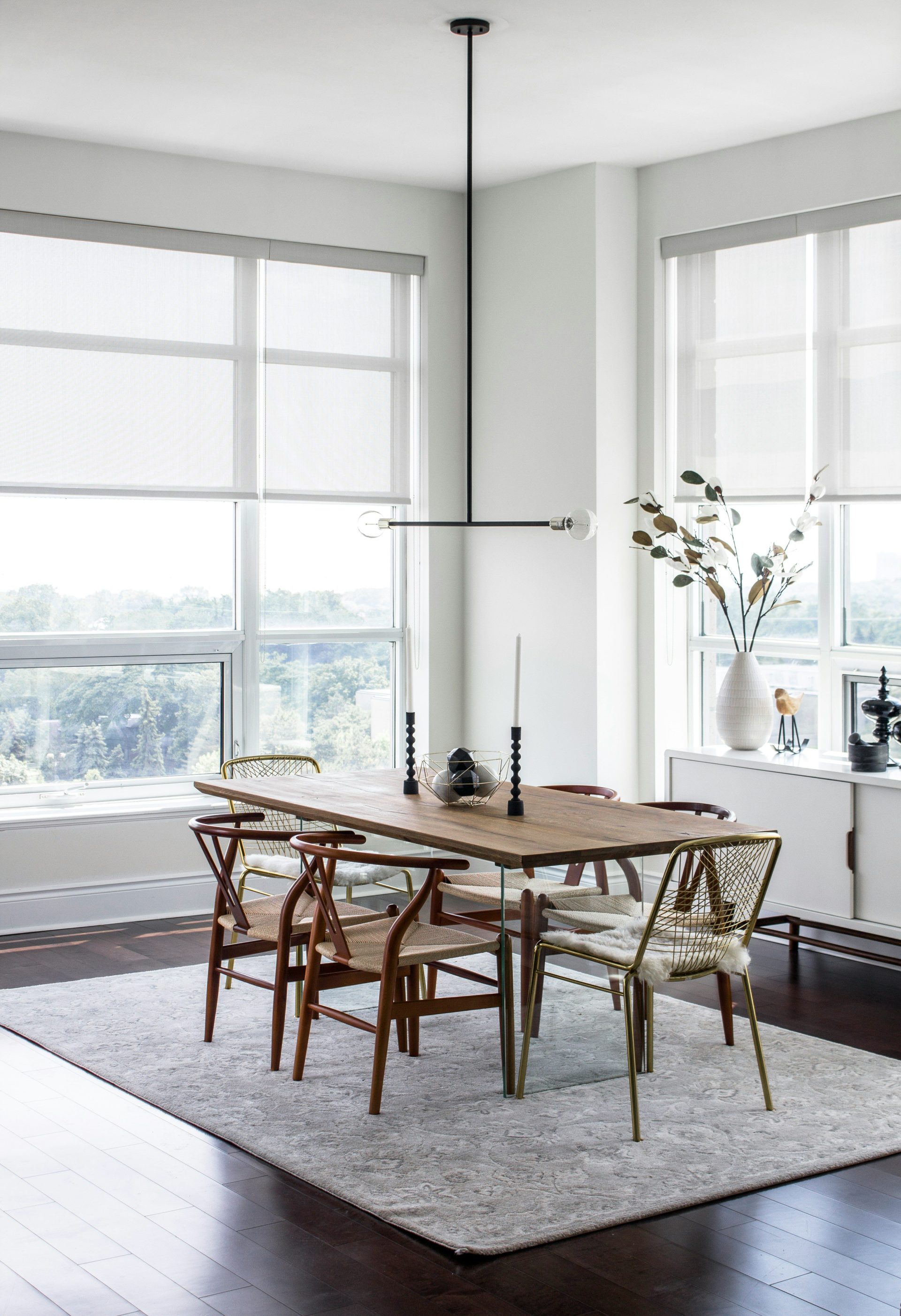 a dining room table with chairs